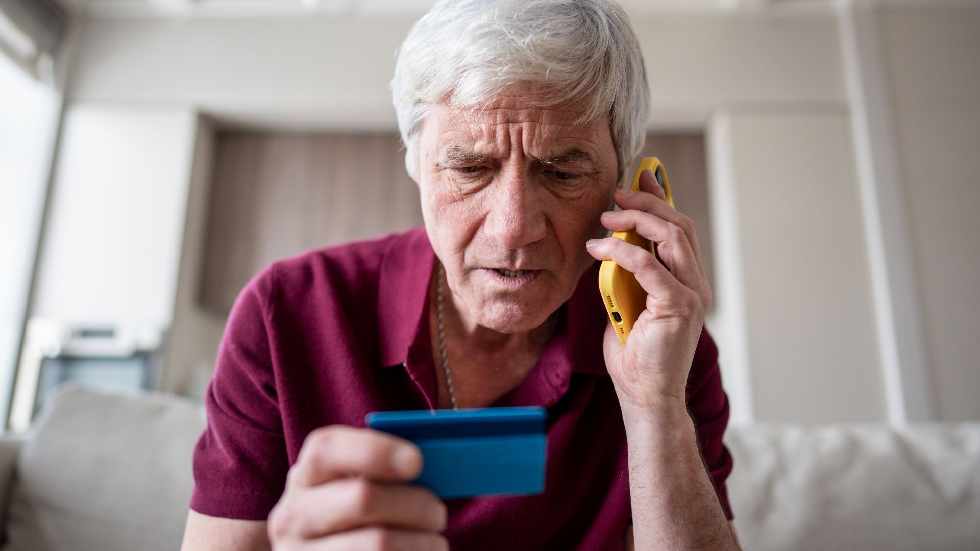 Senior using tablet safely with AI protection